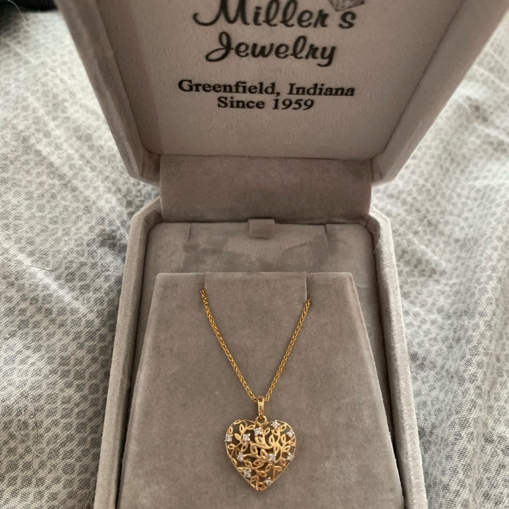 14k gold and diamond heart necklace.